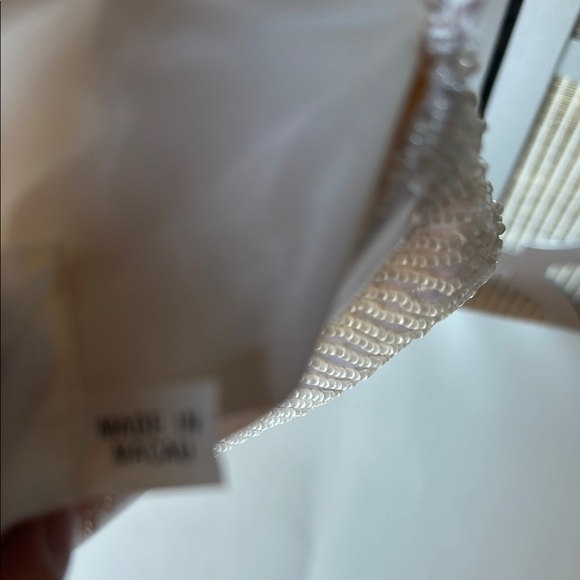 Chic White Wristlet Clutch with Intricate Design - Picture 8 of 10